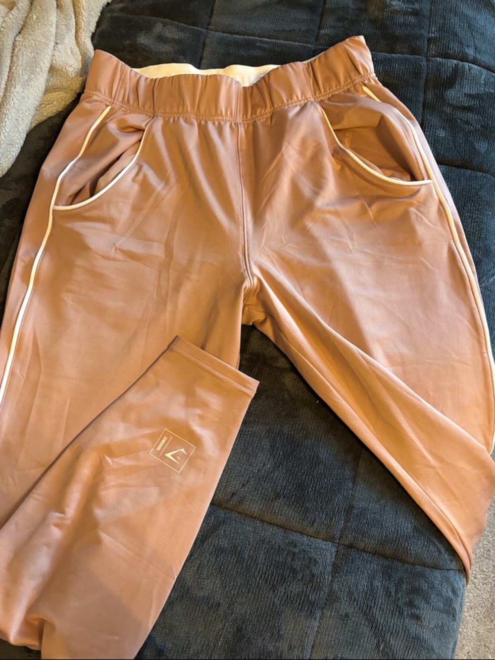 Gymshark light pink Track Joggers with White Trim